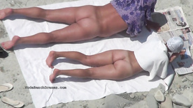 Real life nudists sunbathe at the nude beaches