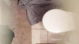 Spying on wife in bathroom