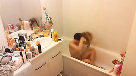 Hidden Cam. Can't stop texting even in the middle of a bath.