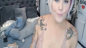 Tattooed Blonde Shows Off Naughtiness On Cam