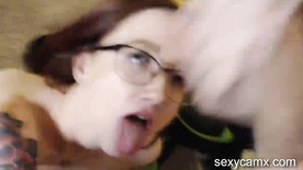 Skinny redhead slut with glasses get big facial after blowjob and hard