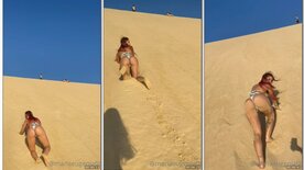 Maria Eugênia sensualizando subindo as dunas lentamente com o rabão pra cima